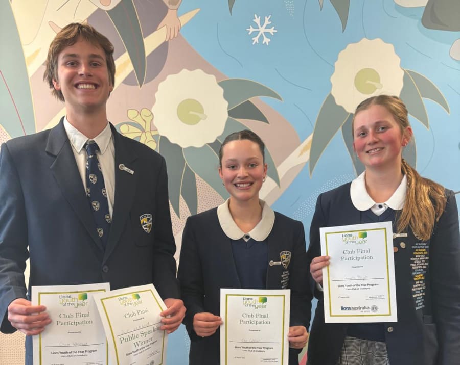 Students proudly displaying certificates after competing in the Lions Youth of the Year public speaking event.